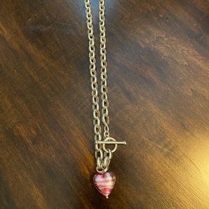 Sterling silver necklace with pink and silver Venetian glass charm.